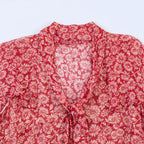 Red Floral Midi Dress with Tie Neck and Ruffled Sleeves