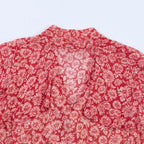 Red Floral Midi Dress with Tie Neck and Ruffled Sleeves